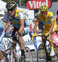 05 - armstrong leads contador along champs-elysees