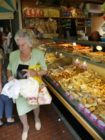 lady in bread market - ventemiglia